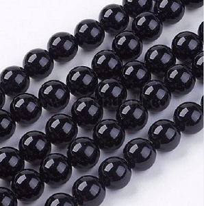 Zwarte onyx, ronde kralen, 10mm, rijggat 1mm. Per snoer van 40cm