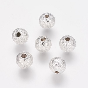 Zilverplated kralen, rond 6mm, stardust met een rijggat van 1mm. Per 200 stuks