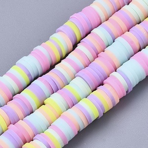 Plat-ronde heishi kralen, 6x1mm, pastelkleuren. Per snoer van ca. 80cm. Rijggat 1,6mm
