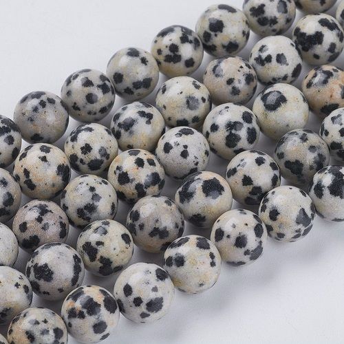 Dalmatiër jaspis, ronde kralen, 4mm, rijggat 1mm. Per snoer van ca. 38cm